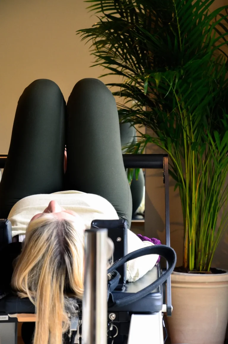 Sublime Wellness woman on pilates machine